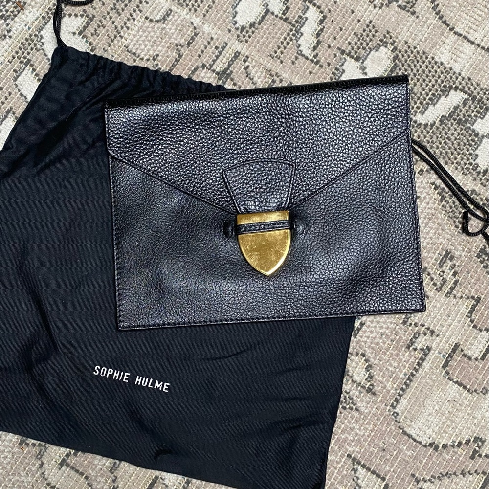 NWOT Sophie Hulme envelope clutch. 100% leather. Dust cover included.